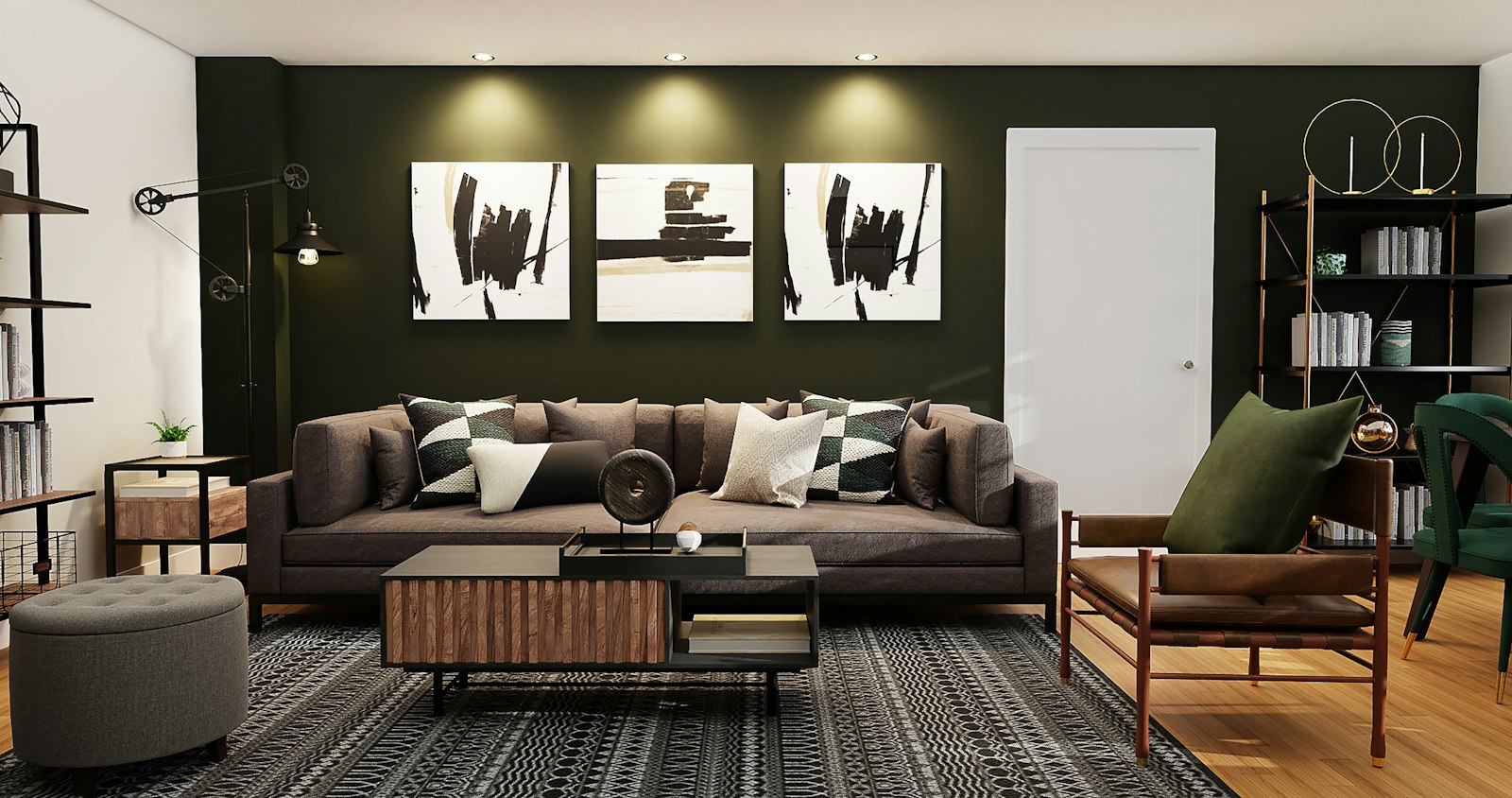 Living room with a deep green painted wall behind a brown sofa