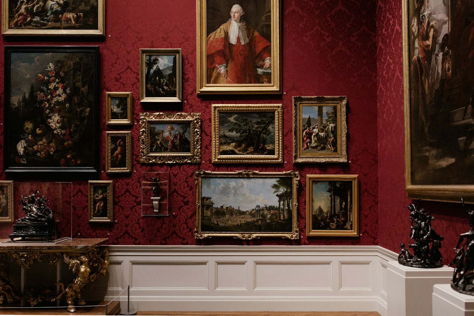 Gallery wall of assorted framed pictures